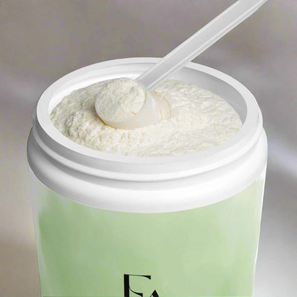 Green container of protein powder with a scoop on a white background